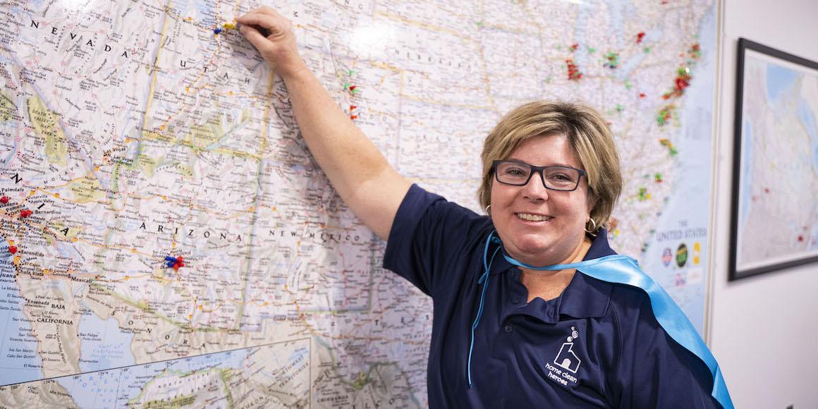 Franchisee Michelle Burnett Placing a Pin on the Franchisee Map